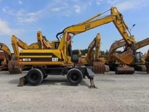 Caterpillar M318 - 1999